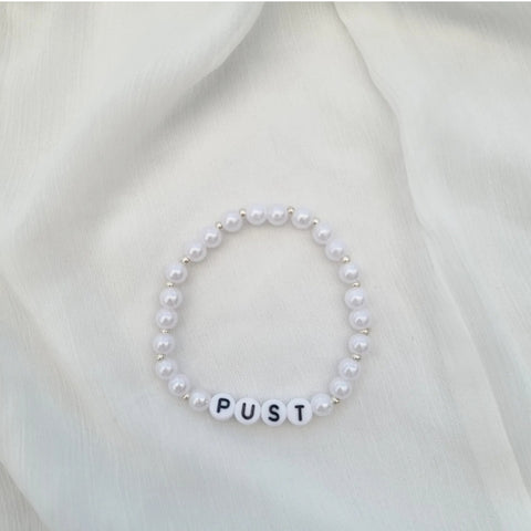 "PUST" perle