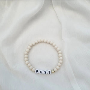 "PUST" creme