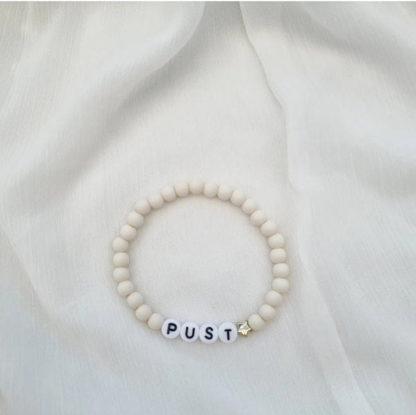 "PUST" creme
