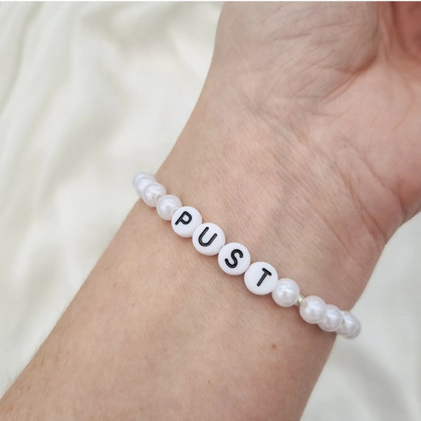 "PUST" perle